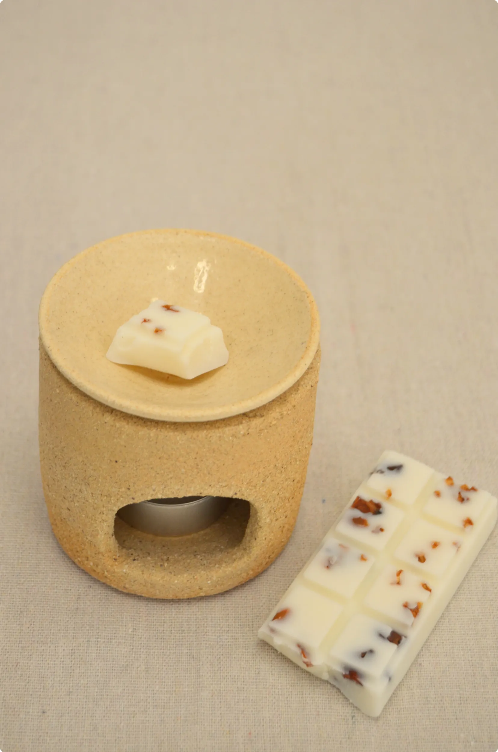 Wax melt sobre el cremador de ceràmica
